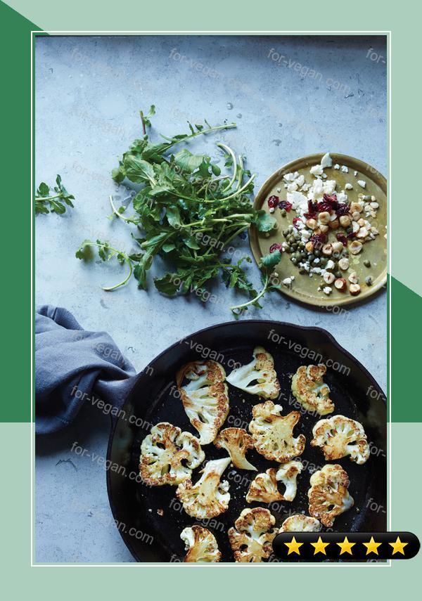 Seared Cauliflower with Arugula, Dried Cranberries, and Hazelnuts recipe