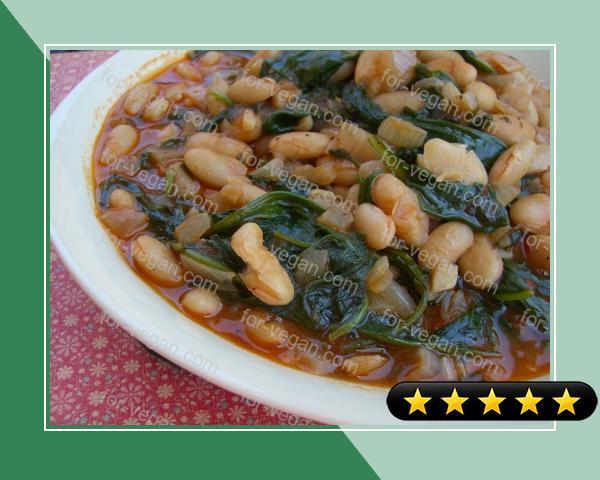 Braised Cannellini Beans With Onions and Arugula recipe